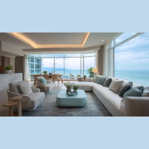 Modern living area interior design with stylish sofa, warm lighting, and elegant wall décor – Chennai home.