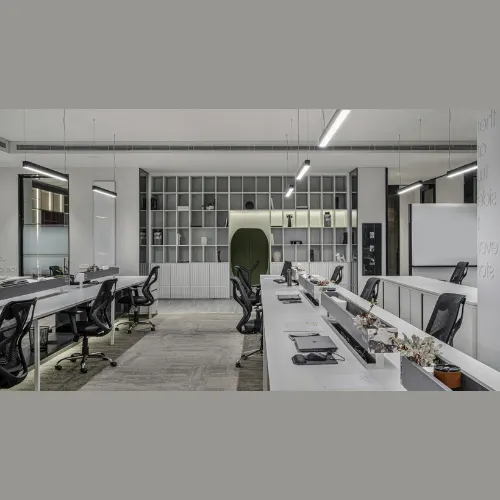 Modern modular workstation interior design with ergonomic desks, partitions, and lighting – Chennai office.